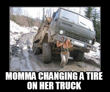 momma-changing-a-tire-on-her-truck