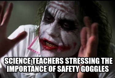 science-teachers-stressing-the-importance-of-safety-goggles