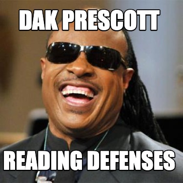 dak-prescott-reading-defenses